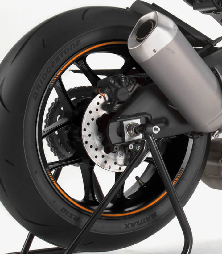 Tira en arco premium naranja flúor Puig para llanta de moto