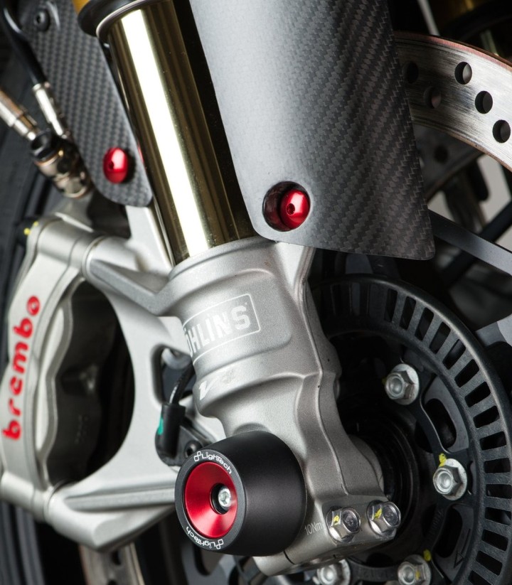 Protezioni perno ruota LighTech anteriori e posteriori in rosso per diversi modelli Aprilia