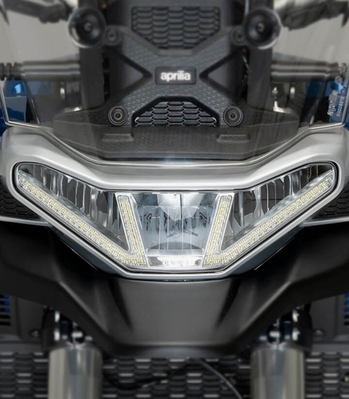 Protector de faro adhere Puig 21185W para Aprilia Tuareg 600 (22-25)