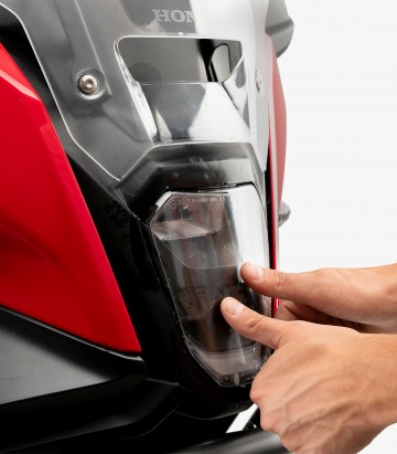 Protector de Faro Adhere Puig 22023W para Honda CB500 Hornet, NX500 (24-25)
