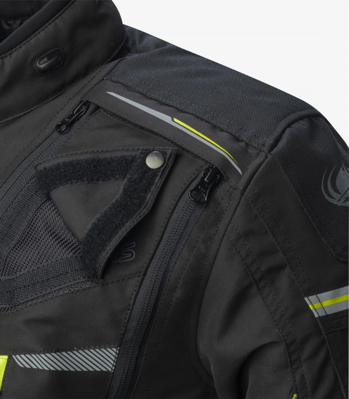 Chaqueta de Invierno unisex Trivor color negro y fluor de Rainers