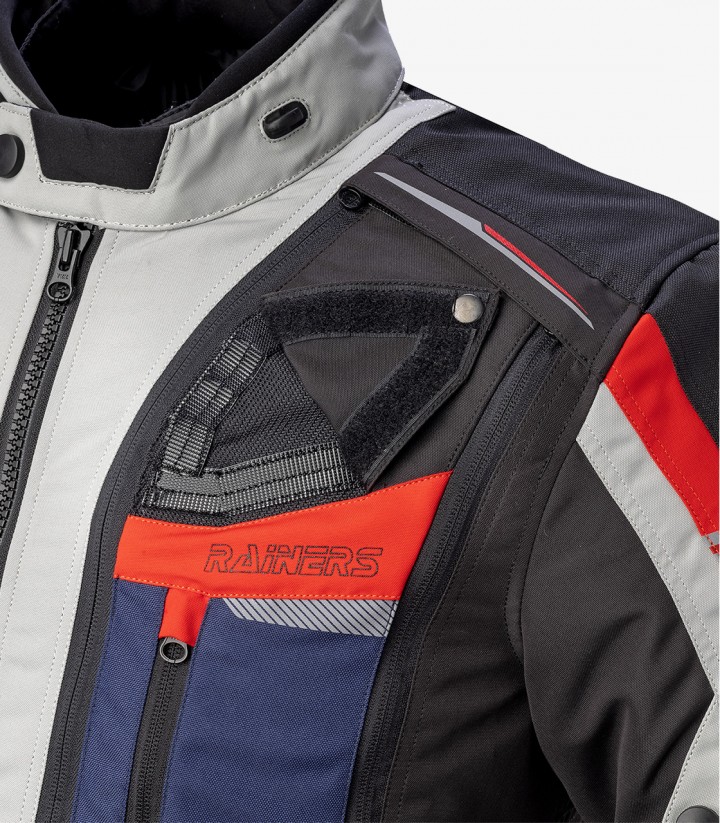 Chaqueta de Invierno unisex Trivor color azul. gris y rojo de Rainers