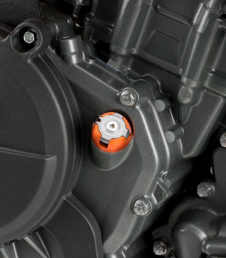 Tapón Cárter Hi-Tech Puig Naranja 7140T para varios modelos de Husqvarna, KTM y Triumph
