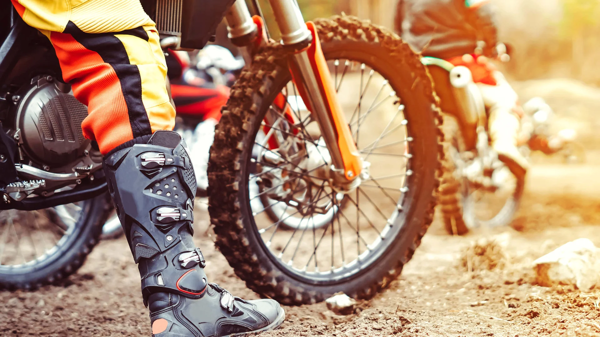 person riding motorcycle showing offroad boots
